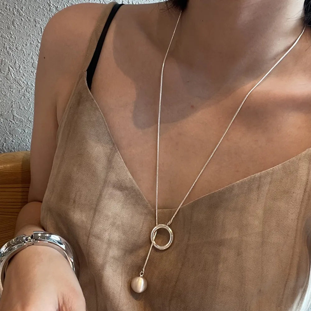 Brushed Silver Ball Necklace – Minimalist Geometric Long Chain Jewelry.