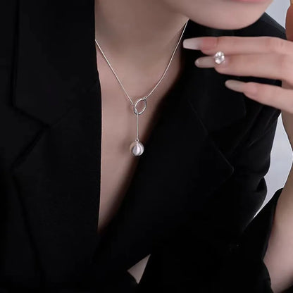 Brushed Silver Ball Necklace – Minimalist Geometric Long Chain Jewelry.