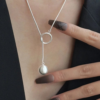Brushed Silver Ball Necklace – Minimalist Geometric Long Chain Jewelry.