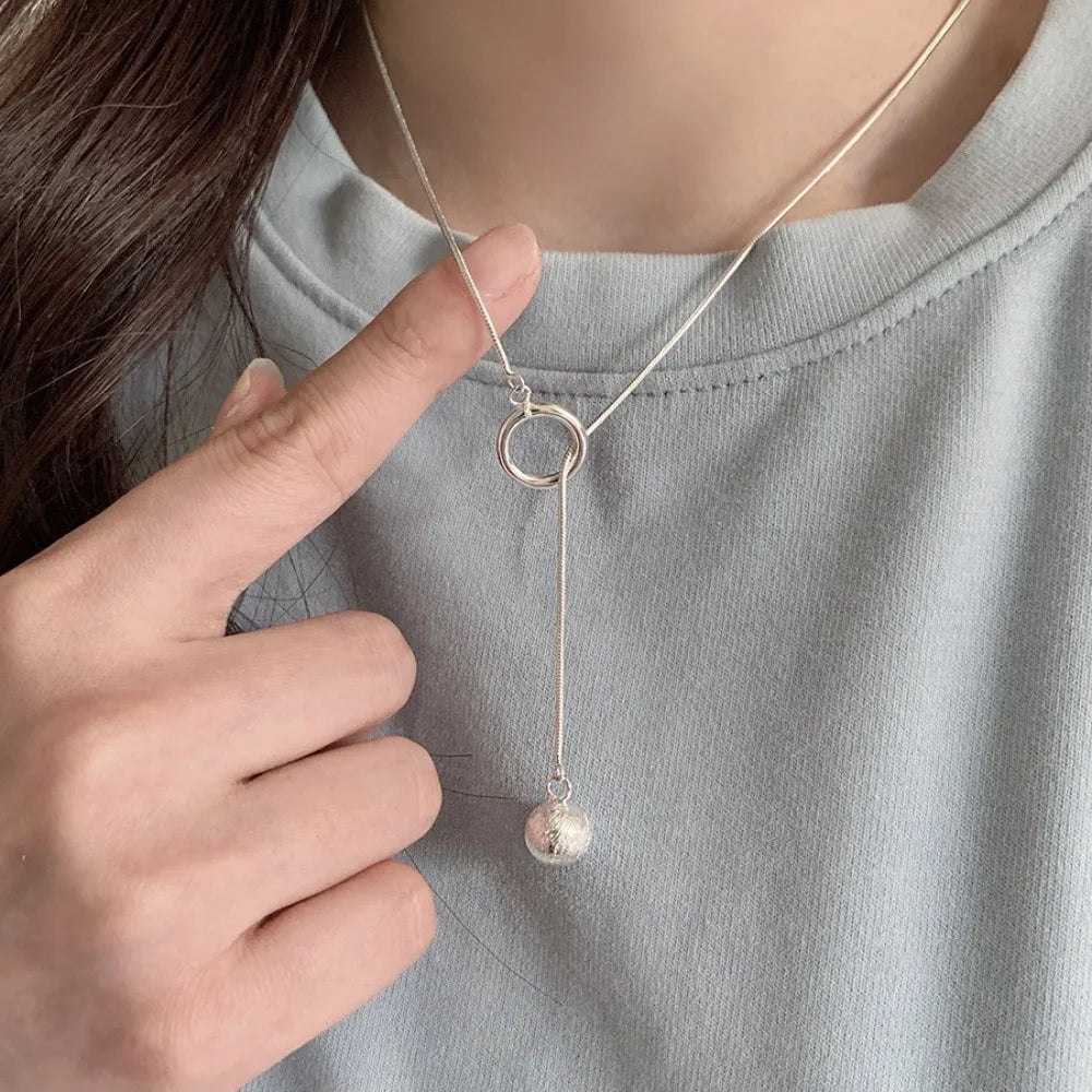Brushed Silver Ball Necklace – Minimalist Geometric Long Chain Jewelry.