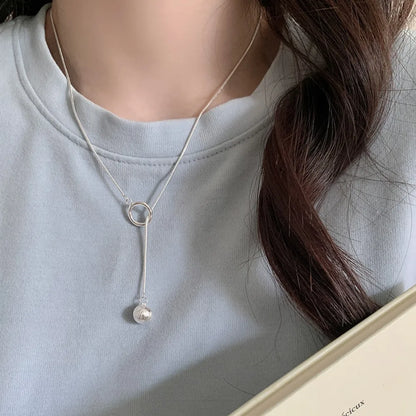 Brushed Silver Ball Necklace – Minimalist Geometric Long Chain Jewelry.