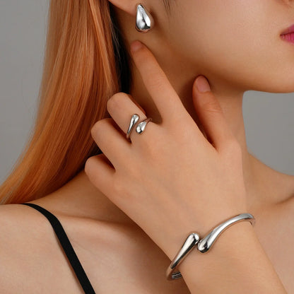 Elegant Water Drop Jewelry Set – Open Bangle, Teardrop Ring & Earrings for Effortless Modern Chic.