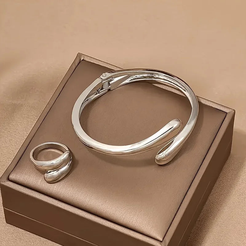 Elegant Water Drop Jewelry Set – Open Bangle, Teardrop Ring & Earrings for Effortless Modern Chic.