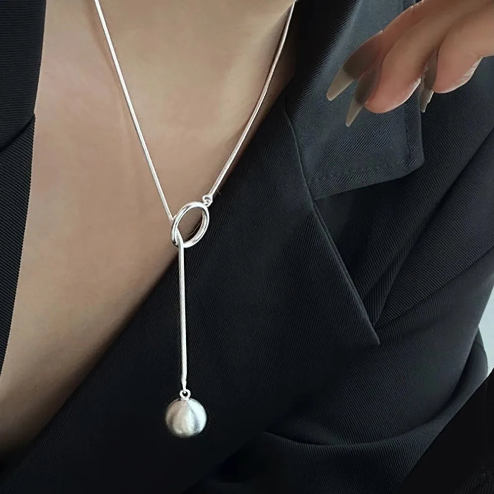 Brushed Silver Ball Necklace – Minimalist Geometric Long Chain Jewelry.