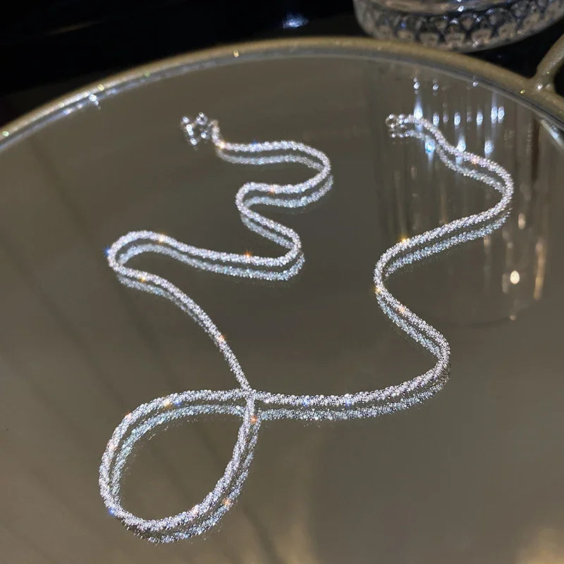 Geometric Hollow Heart Necklace – Modern Minimalist Pendant for Women.