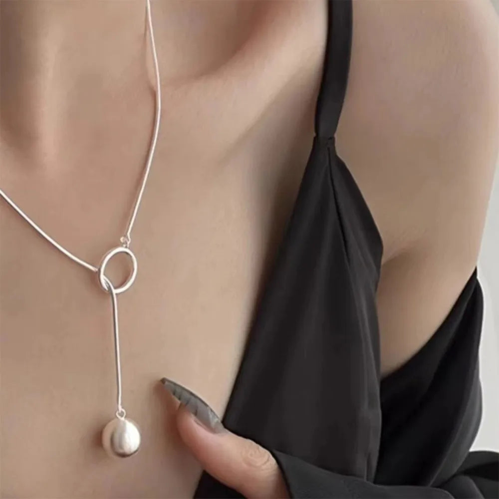 Brushed Silver Ball Necklace – Minimalist Geometric Long Chain Jewelry.