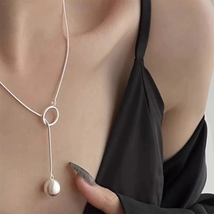 Brushed Silver Ball Necklace – Minimalist Geometric Long Chain Jewelry.