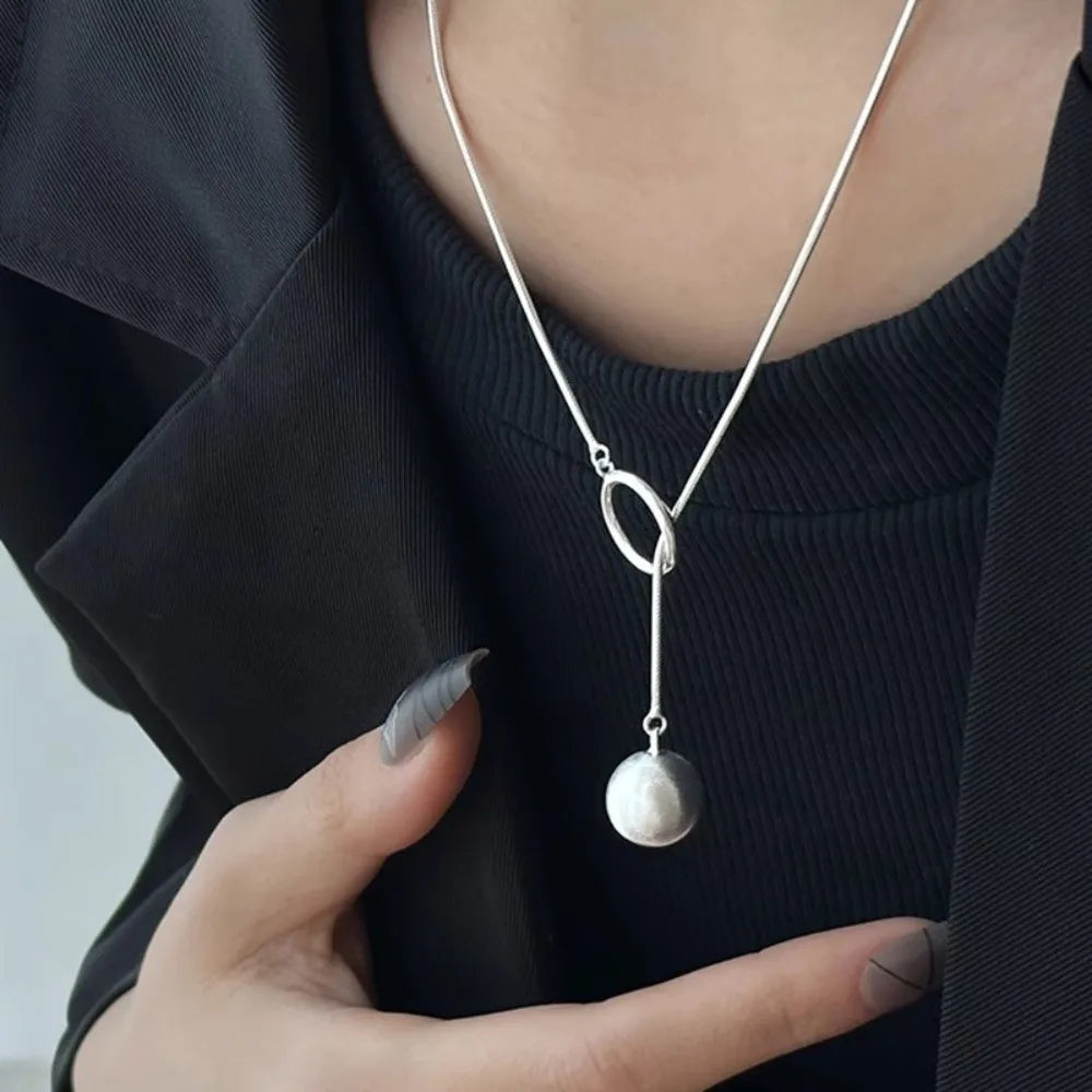 Brushed Silver Ball Necklace – Minimalist Geometric Long Chain Jewelry.