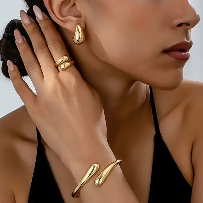 Elegant Water Drop Jewelry Set – Open Bangle, Teardrop Ring & Earrings for Effortless Modern Chic.