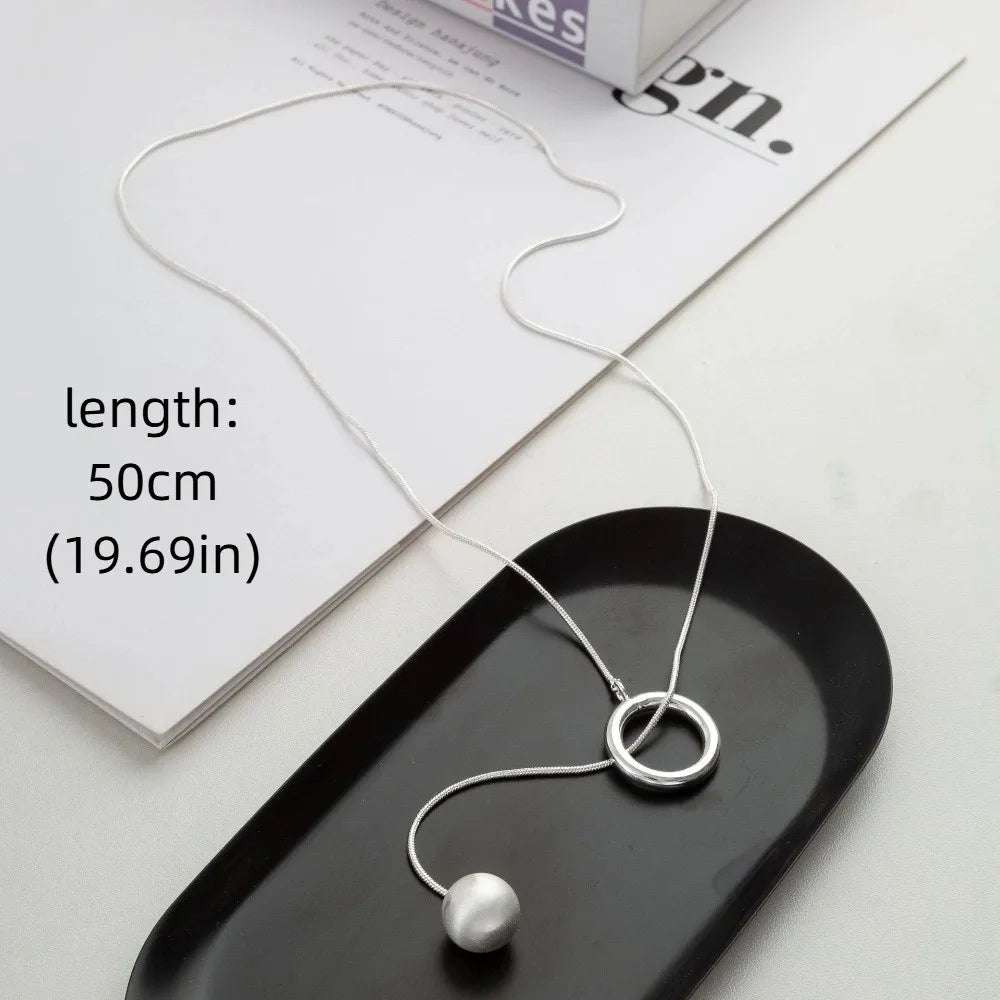 Brushed Silver Ball Necklace – Minimalist Geometric Long Chain Jewelry.