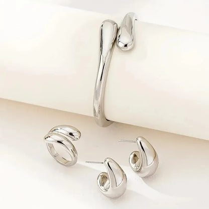 Elegant Water Drop Jewelry Set – Open Bangle, Teardrop Ring & Earrings for Effortless Modern Chic.