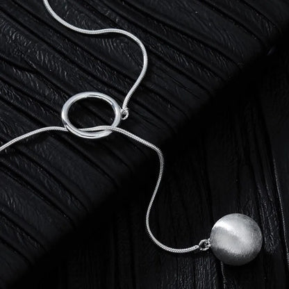 Brushed Silver Ball Necklace – Minimalist Geometric Long Chain Jewelry.