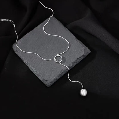 Brushed Silver Ball Necklace – Minimalist Geometric Long Chain Jewelry.