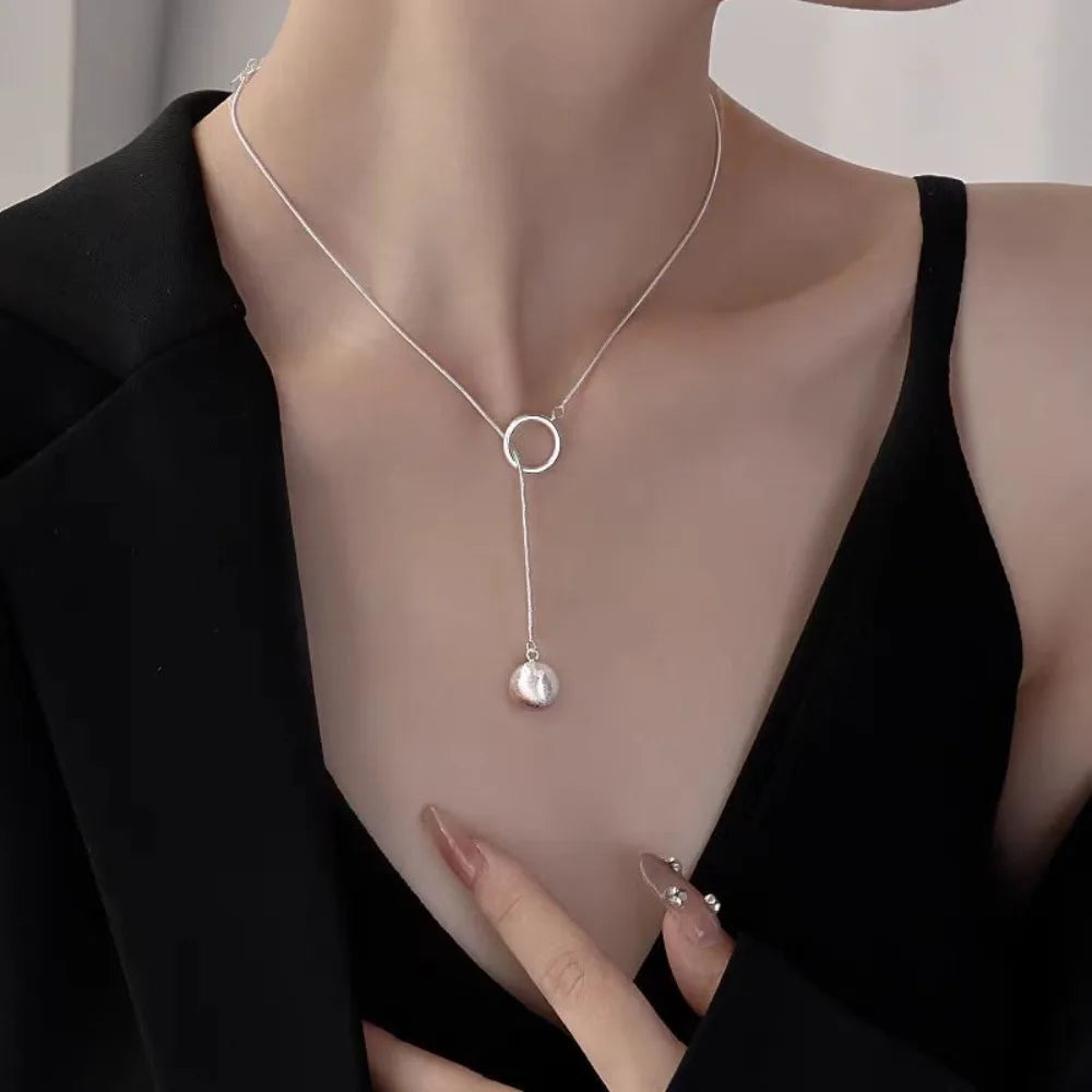 Brushed Silver Ball Necklace – Minimalist Geometric Long Chain Jewelry.