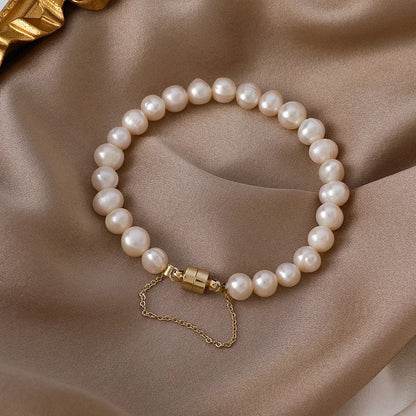 Lustrous Pearl Harmony Bracelet – 14K Gold-Filled Magnetic Clasp Jewelry for Women.