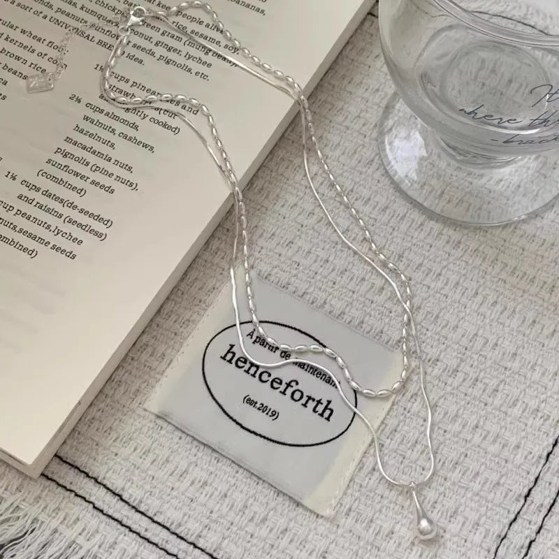 925 Sterling Silver Double-Layer Necklace – Minimalist Rice Droplet Pendant.