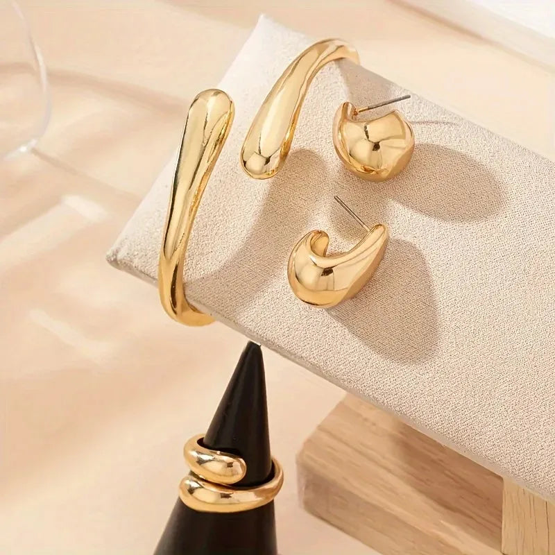 Elegant Water Drop Jewelry Set – Open Bangle, Teardrop Ring & Earrings for Effortless Modern Chic.